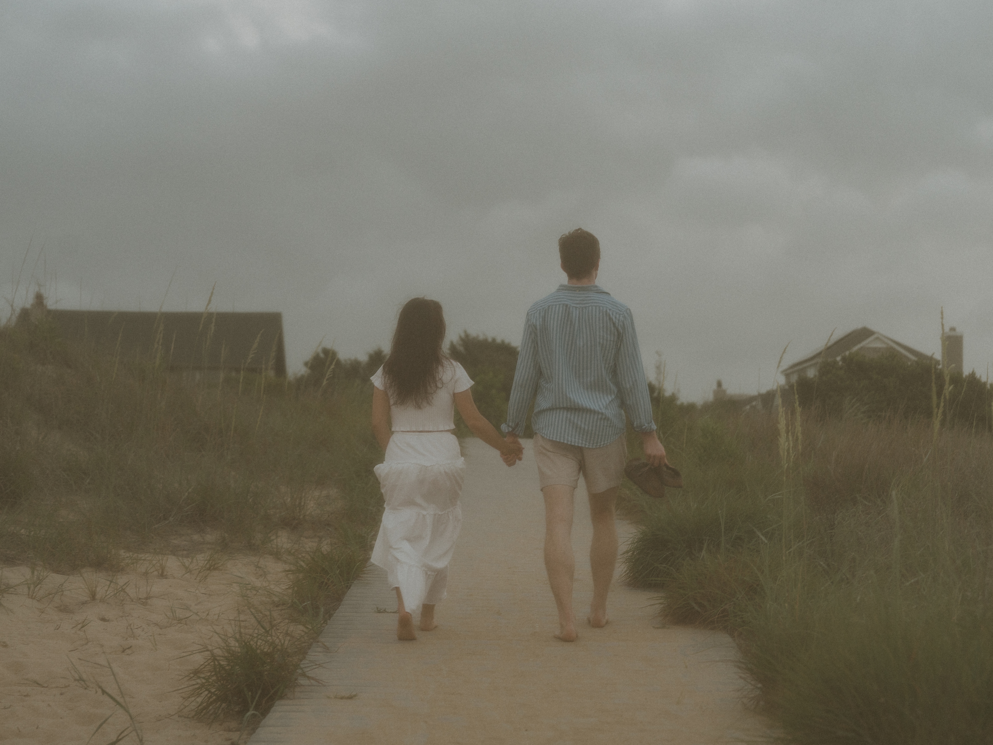 Luke and Mary smiling on the boardwalk
